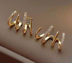 Gold Claw Crawler Earrings