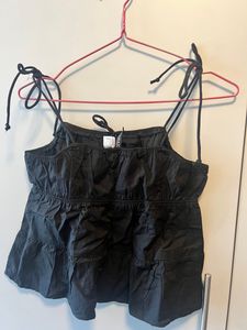 Sleeveless Peplum Top