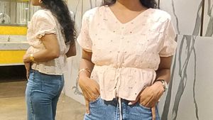 Elegant Eyelet Tie-Waist Top