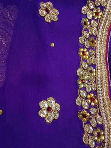A Purple Blue Saree With Heavy Work