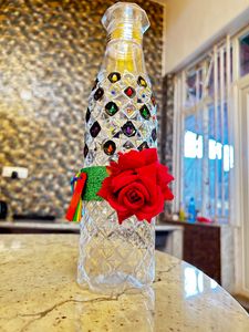 Crystallized designer plastic bottle