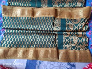 Selling A Beautiful Green Banarsi Saree