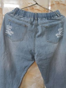 Distressed Denim Jeans