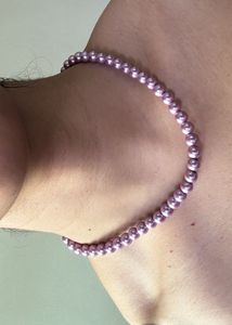 Pair of White Pearl Earrings And Two Necklaces
