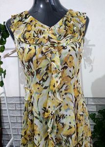 Yellow Ruffled Printed Knee Length Dress