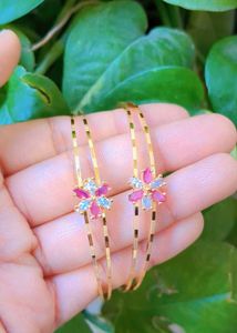 Floral Design Gold Bangles