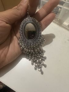 Long silver finish earrings