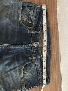 Distressed Denim Jeans