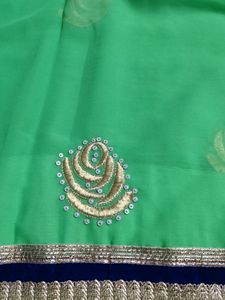 Pista Green Colour Embroidered Saree.