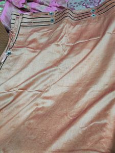 rust orange colour saree with black border