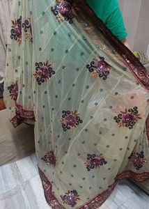 Multicoloured Net saree With maroon Blouse