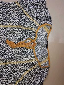 Casual too. Mix of Rayon and Polyester.