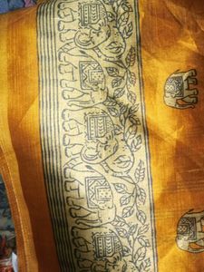 Ethnic Elephant pring yelloish orange saree...