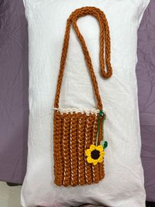 A Beautiful Crochet Handmade Mobile Sling Bag.