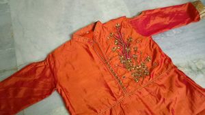 Elegant Orange Embroidered gown