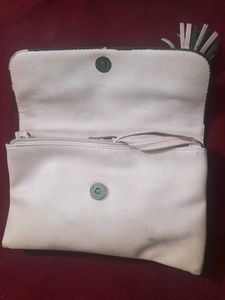 Chic Peach Clutch with Floral Detail