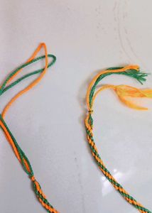 Orange And Green Thread Rakhi