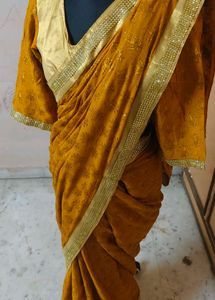 Elegant Mustard Saree with Gold Border