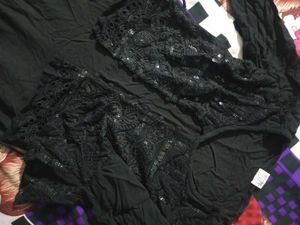 Elegant Black Dress with Lace Detail