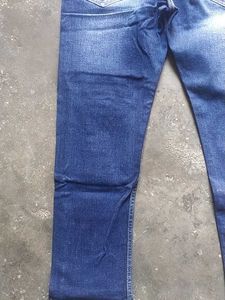 Ripped Blue Denim Jeans