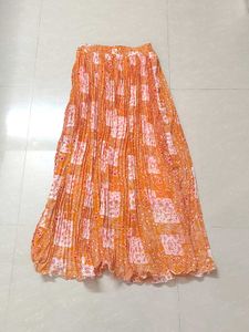 Pleated Orange Skirt