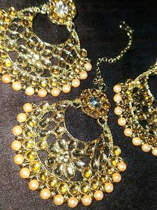 Heavy Earrings And Magtika