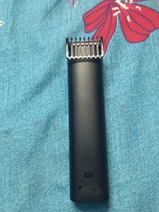 MI TRIMMER NEW CONDITION