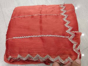 Elegant Red Saree with Silver Embellishments