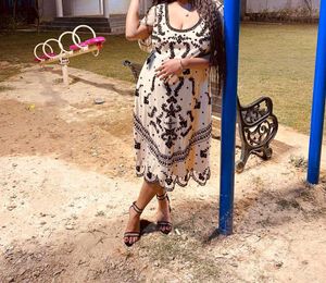 A Beautiful Dress With Black Embroidery...