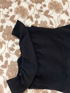 Elegant Black Strapless Jumpsuit with Bow Detail