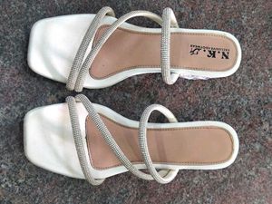 white , sparky heels