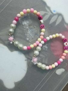 4 BRACELETS TWO PINK 2 GREEN POPULAR ITEMS