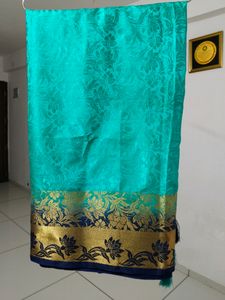 Teal And Blue Tapeta Silk Saree
