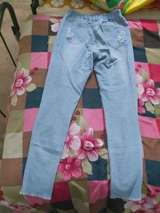 Ripped Light Blue Jeans