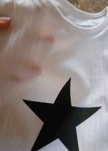 star print sleeveless top