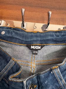 Distressed Denim Jeans