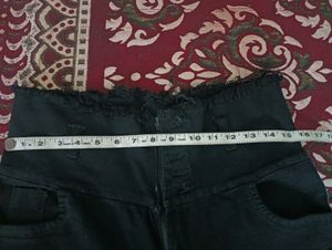 Black One Leg Knee Cut Jeans