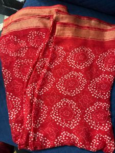 Red synthetic saree with blouse