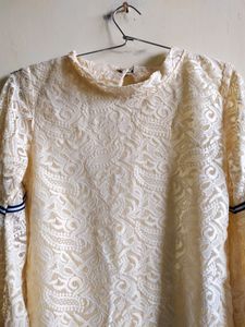 Top ,white cream in colour,