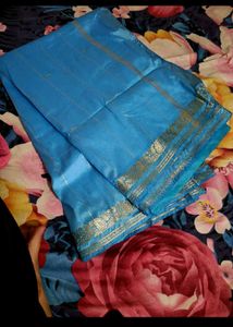 Woman Silk saree with stitched blouse