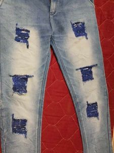 Distressed Denim Jeans