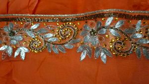 Orange Embroidered Saree.