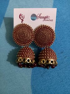 Two sets of Earrings and a small coral clip!