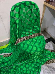 Green Leaf Saree With Yellow Stones.