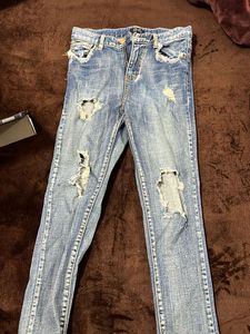 Distressed Denim Jeans