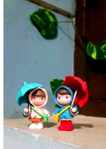 Cute cartoon little girl holding an umbrella