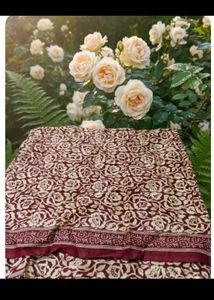 Elegant Green Saree with Flower Design