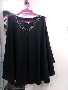 A Black Party Cape Top.