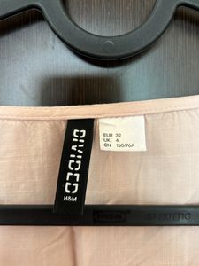 H&amp;M&#39;s Baby Pink Top