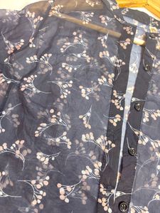 Navy blue with peach floral design shirt
